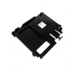 Reverse side of plastic thermal bracket showing embedded metal pad
